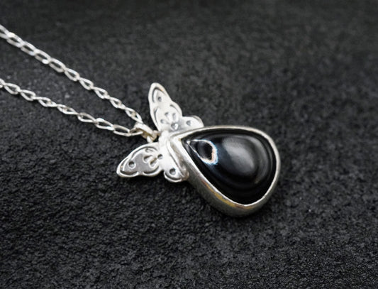 Mariposas Halskette Psilomelan