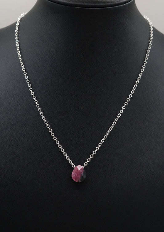 Schimmernde Tropfen Rhodonit